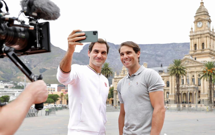 Even Roger Federer and Rafael Nadal couldn't resist the lure of a Table Mountain selfie when they visited the Grand Parade in Cape Town on February 7 2020.