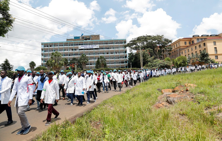 Doctors and medical practitioners under the Kenya Medical Practitioners Pharmacists and Dentists Union (KMPDU) participate in a demonstration to demand payment of their salary arrears and the immediate hiring of trainee doctors, among other grievances, in Nairobi, Kenya, April 16, 2024.