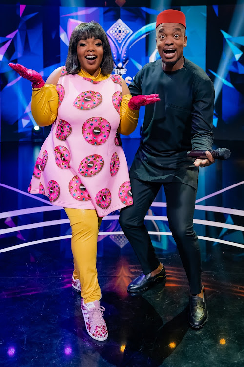 Award-singer Shekhinah with the host of the Masked Singer SA Mpho Popps.