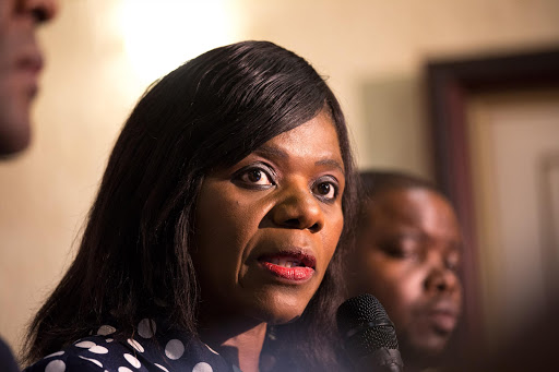 Advocate Thuli Madonsela speaks at a media briefing on December 4, 2013 in Pretoria, South Africa. The public protector has rubbished claims by the ANC that her office had leaked the report on security upgrades to the president's Nkandla home. She told the media that a draft of her provisional report on Nkandla was only given to five ministers.