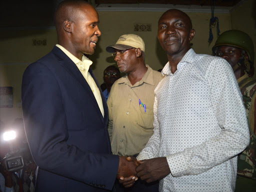 Gem Central MCA Fred Ouda (right) celebrates at the Goan Institute after he was announced the winner of the Kisumu Central constituency ODM ticket in repeating polls on Tuesday night. He is congratulated by returning officer Samson Odoyo / FAITH MATETE