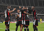 Orlando Pirates players celebrate one of their goals in the Nedbank Cup quarterfinal against AmaZulu.
