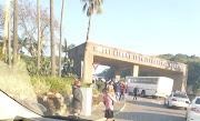 Disgruntled staff gather outside Durban's Inkosi Albert Luthuli Central Hospital on Thursday