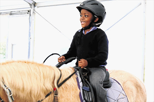 HORSING AROUND: Riding can give children with disabilities freedom of movement and independence