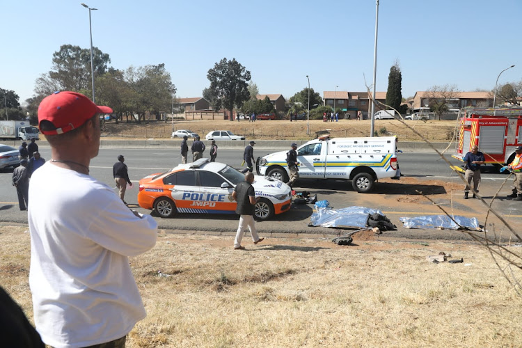 Four people died after a taxi collided with a bus on the M1 North near the Xavier offramp