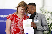Lance Minnies of Mitchells Plain receives his award from Western Cape education MEC Debbie Schafer on January 10 2019. Minnies said that when he was depressed and wanted to give up, his teachers stood by him and pulled him through. 