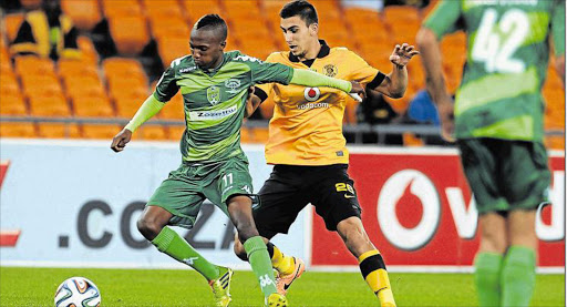 CRUNCH-TIME: Mduduzi Mabaso, of FC Buffalo, holds off Chiefs’ Lorenzo Gordinho. Stakes will be high for Chiefs and Pirates tomorrow Picture: GALLO IMAGES