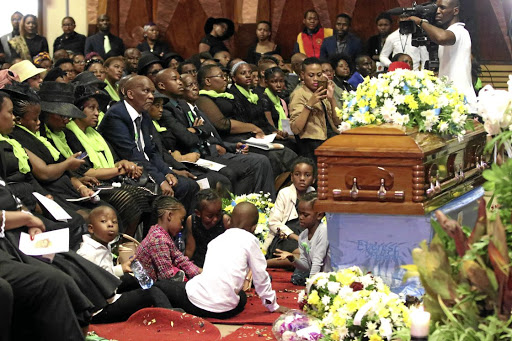 Thoriso Themane's family and friends pay their last respects at his funeral yesterday.