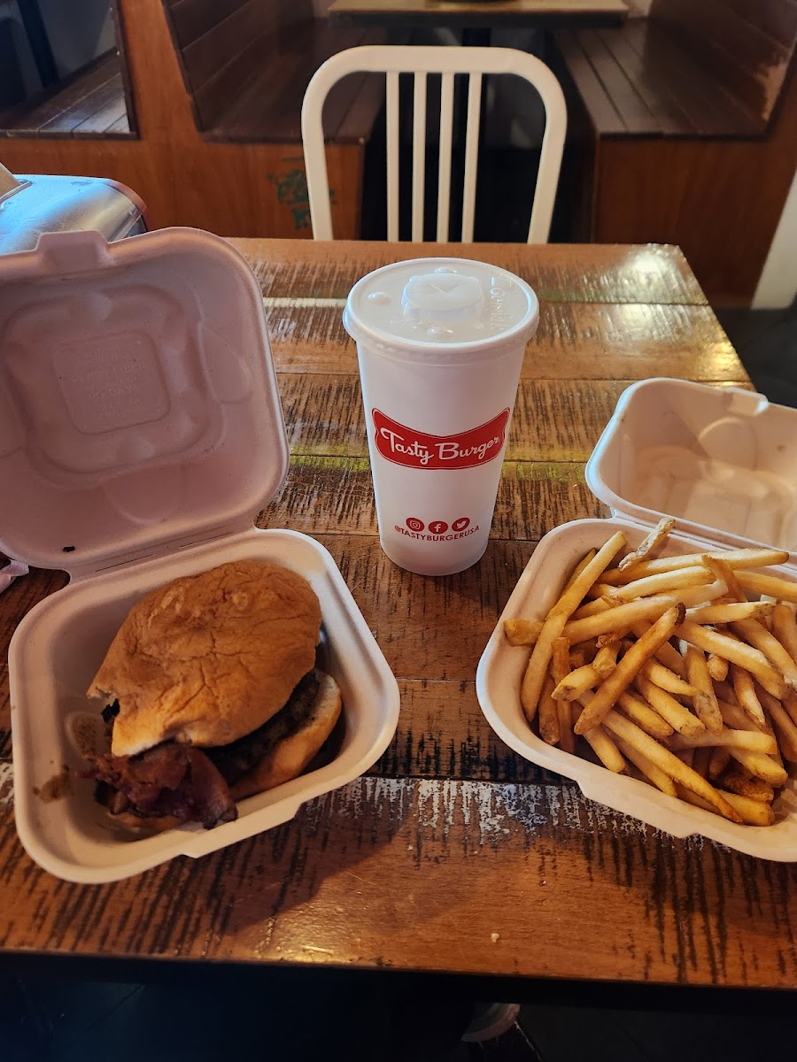 Bacon burger with a gf bun and fries