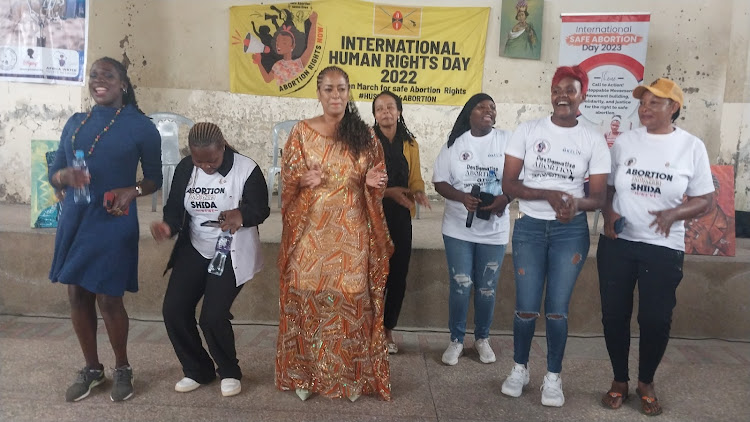Nairobi Woman Representative Esther Passaris joins locals in a jig at Huruma Social Hall in Mathare, Nairobi on April 18, 2024.