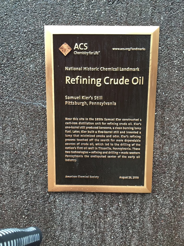  In downtown Pittsburgh, at the corner of Grant St and 7th Ave appears this plaque. Samuel Kier developed a process to refine crude oil into kerosene for lamp fuel. 