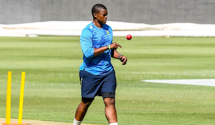 Sisanda Magala training with CSA technical team member during the South Africa national cricket team training session at Imperial Wanderers Stadium on April 09, 2021 in Johannesburg, South Africa.