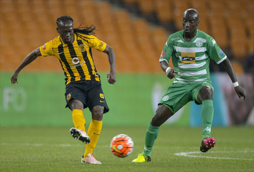 Reneilwe Letsholonyane of Kaizer Chiefs and Musa Nyatama of Bloemfontein Celtics during the Absa Premiership match between Kaizer Chiefs and Bloemfontein Celtic at FNB Stadium on May 04, 2016 in Johannesburg, South Africa. Picture Credit: Sydney Seshibedi