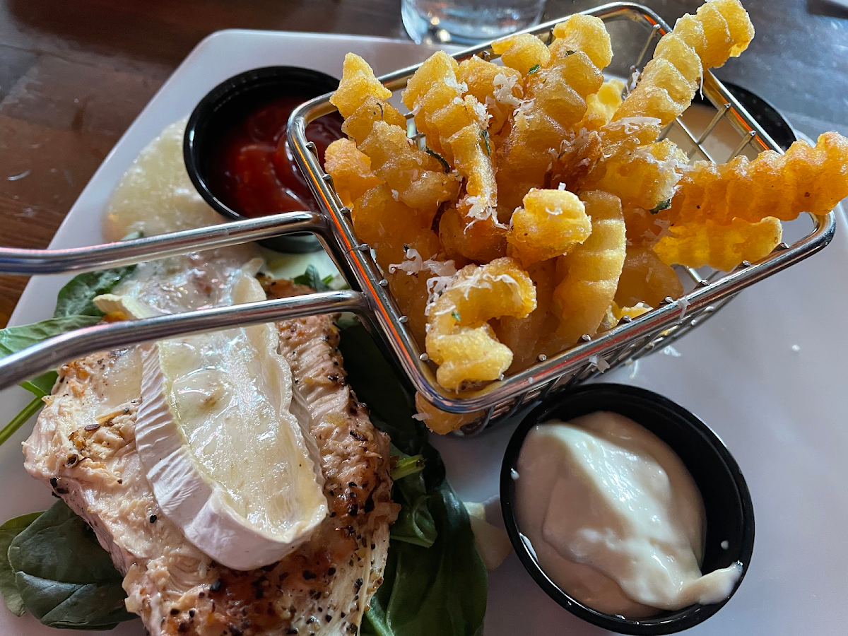 Truffle fries (deep fried, very crunchy. Dipping sauce had truffle oil and butter. Fairly salty) brie and chicken breast