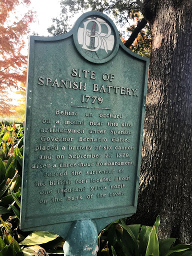 Behind an orchard on a mound near this site artillerymen under Spanish Governor Bernardo Galvez placed a battery of six cannon and on September 21, 1779, after a three-hour bombardment, forced the...