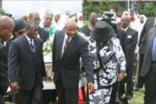 LIFE WELL LIVED: At the funeral of Adelaide Tambo at the Wattville Stadium hundreds of people came to pay their respects. Members of the ANC executive carried her coffin to the hearse. Pic. Mbuzeni Zulu. 11/02/07. © Sowetan.