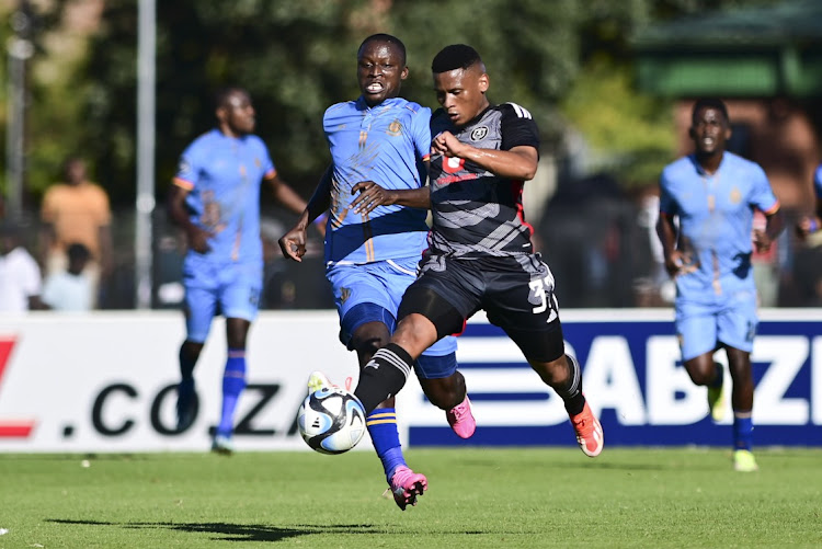 Thabiso Lebitso of Orlando Pirates outsmarts Khethuhuthula Ndlovu of Royal AM during their DStv Premiership match at Harry Gwala Stadium yesterday.