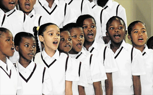 IN UNISON: Seen here is The AW Barnes Primary School Choir will be helping to spread the festive cheer for residents of the DJ Sobey Old Age Home this Saturday