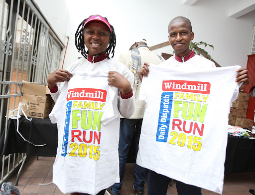 SEPTEMBER 19, 2015 Siblings Dr. Zimbini Magobiane and her brother Lunga Mkonko full of smiles as they gather their gear and T-Shirts ahead of Sunday Dispatch Family Fun Run Picture MARK ANDREWS © DAILY DISPATCH