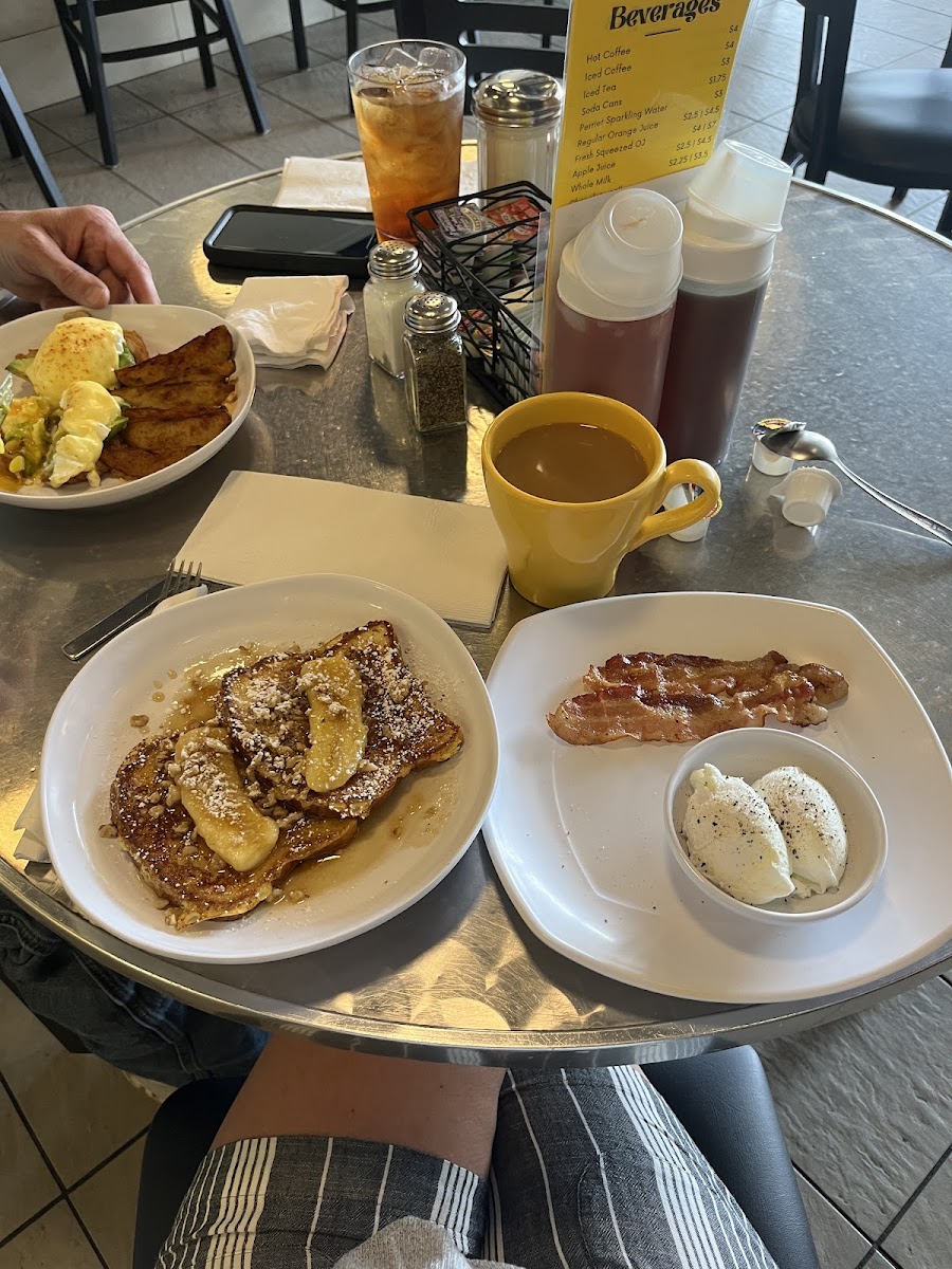 Bananas foaster french toast, poached eggs, and bacon. And delicious coffee!