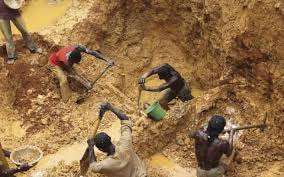 Workers at a gold mine.