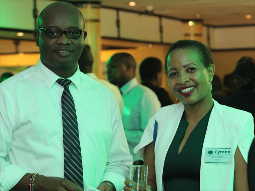 Cytonn Investment chief executive Edwin Dande with CJW advocate Jennifer Wambui.