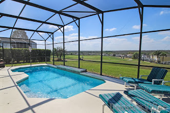 West-facing golf course views from the private pool of this Highlands Reserve villa