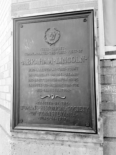 THIS  TABLET COMMEMORATES THE FIRST VISIT OF ABRAHAM LINCOLN WHO ARRIVED AT THIS POINT ON FEBRUARY 14 1861 REMAIN-ING IN PITTSBURGH A FEW HOURS ENROUTE TO WASHINGTON FOR HIS INAUGURATION ERECTED...