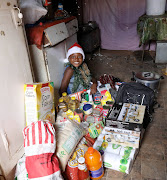 Bokamoso Mathibe 'Tamati' at home after Christmas gifts,groceries and school uniform 