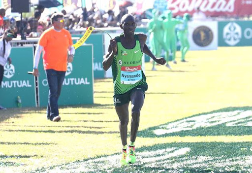 Hatiwande Nyamande nearing the finishing line at the third in the 2017 Comrades Marathon on June 04, 2017 in Durban, South Africa.