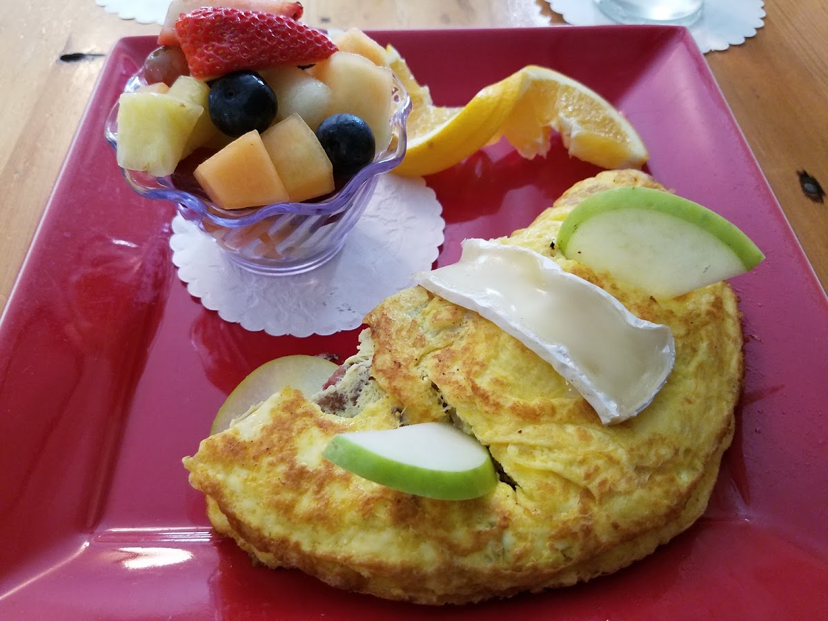 apple, bacon brie omelette with fruit