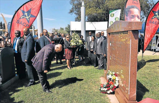 HONOURING THE MEMORY: President Jacob Zuma lays a wreath at the grave of the late SACP and ANC leader Chris Hani at Memorial Park in Boksburg yesterday Piicture: GCIS