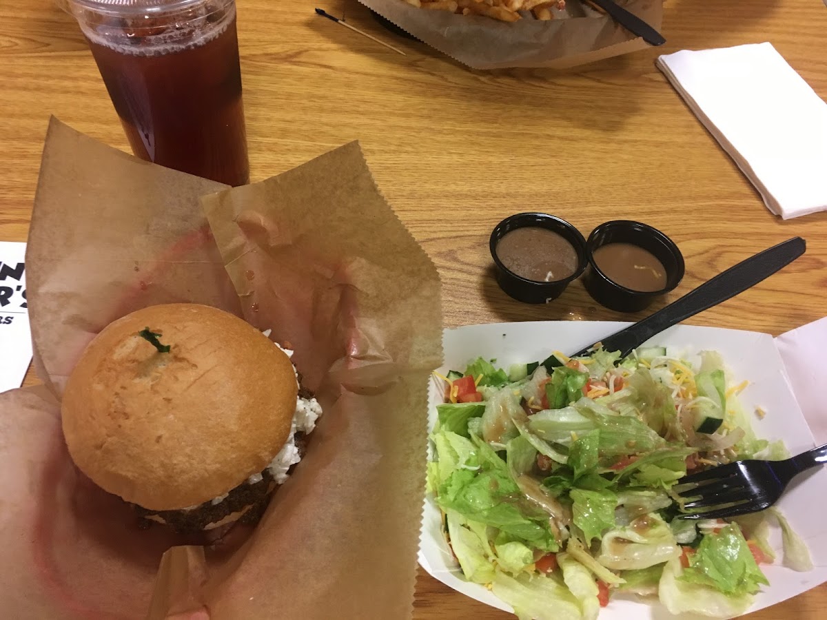 Gluten free bun. Gluten free chili. This is an all the way cheeseburger. Salad bc unfortunately their fries have a gluten batter on them. Great service. Very understanding and patient. They have many