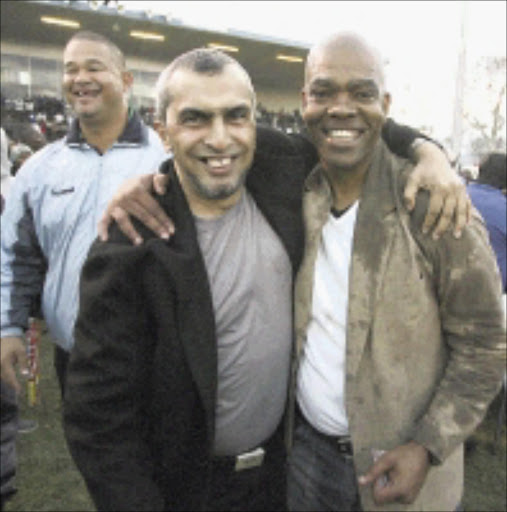 PIETERMARITZBURG, SOUTH AFRICA - 29 June 2008, Mr. Farouk Kadodia and Coach Ian Pamler during the National First Division playoff 2nd leg between Maritzburg United and FC AK held the Harry Gwala Stadium in Pietermaritzburg, South Africa.\nPhoto by Gallo Images\n\nOVERJOYED: Maritzburg United boss Farouk Kadodia and head coach Ian Palmer celebrate after gaining promotion to the Premiership next season. page 42, sow 01/06/08.