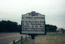 Of the Royal Navy. Sent by Gov. Spotswood of Virginia, in the sloop "Ranger," killed the pirate Blackbeard off shore, 1718.Plaque via North Carolina Highway Historical Marker Program, and is used...