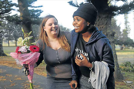 FOR THE GREATER GOOD: Kirsten Roebuck, left, and Khanya Njengele were reunited yesterday after a harrowing experience Picture: SIBONGILE NGALWA