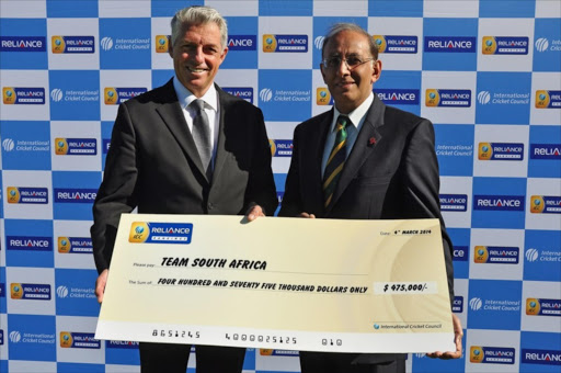 Dave Richardson (ICC CEO) and Haroon Lorgat (CSA CEO) during the ICC Cheque handover to CSA at Sahara Park Newlands on April 15, 2014 in Cape Town, South Africa. (Photo by Grant Pitcher/Gallo Images)