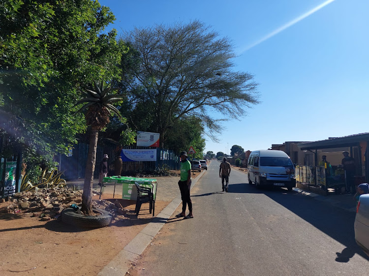 The empty street outside the polling station at Ingqayizivele Secondary School in Thembisa.