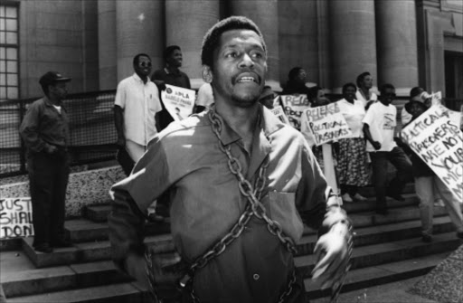 Golden Miles Bhudu and members of SAPOHR hold a protest march for political prisoners from Khotso house to the Supreme Court. Pic: Cathy Pinnock. 10/11/95. © Business Day.