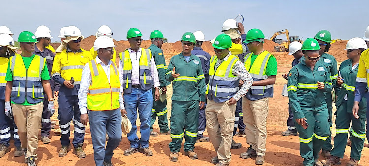 Members of the NEMA Board in company of the Executive director NEMA Dr Barirega Akankwasah and John Habumugisha the deputy managing director East African crude oil pipeline inspect activities in Hoima.