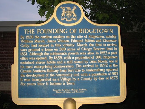 By 1826 the earliest settlers on the site of Ridgetown, notably William Marsh, James Watson, Edmund Mitton and Ebenezer Colby, had located in this vicinity. Marsh, the first to arrive, was granted...