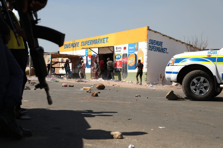 Police are monitoring the situation in White City following attacks aimed at foreign owned shops in the township.