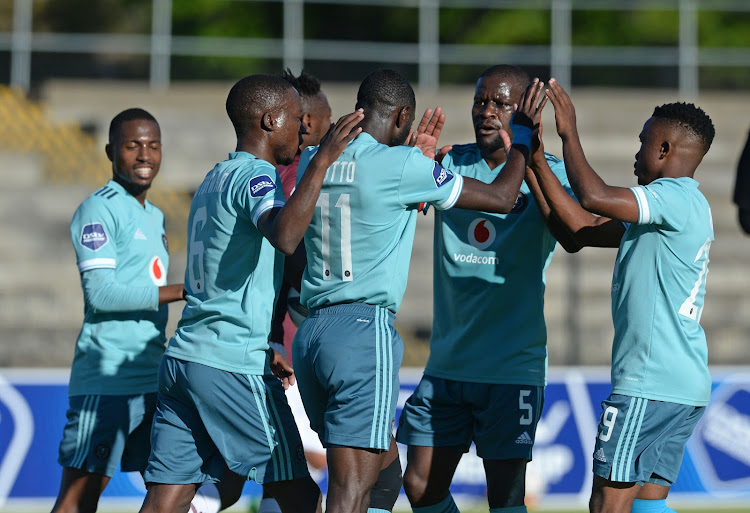 Deon Hotto celebrates with his Orlando Pirates teammates after scoring one of his two goals against Stellenbosch at the Danie Craven Stadium in Stellenbosch on Wednesday November 24 2021.