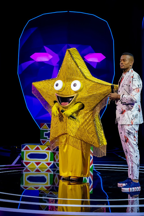 Host Mpho Popps and the unmasked Star aka Nonkanyiso 'LaConco' Conco on Masked Singer SA