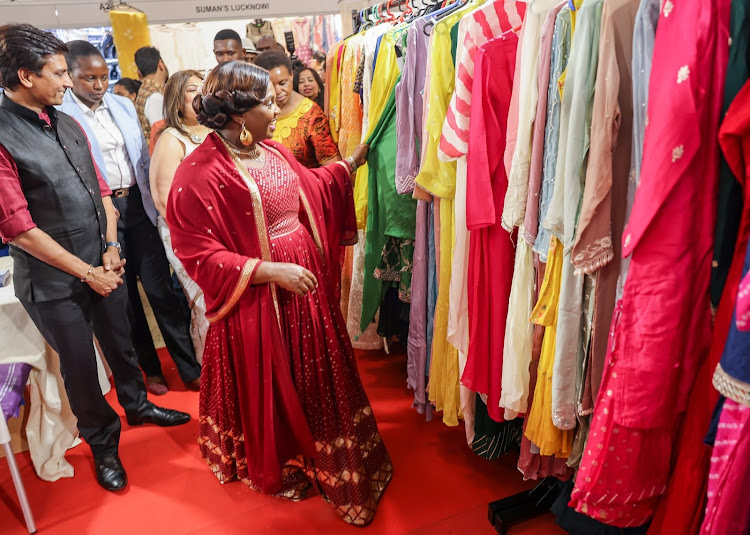 Second Lady Pastor Dorcas Rigathi looking at items on display during the ‘UUF Labels Fashion Show 2024’, at Oshwal Centre, Nairobi.