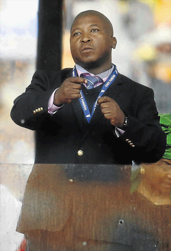 BOGUS PERFORMANCE: Thamsanqa Jantjie makes gestures during a speech at the memorial service for Nelson Mandela at the FNB Stadium this week