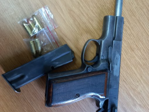 The suspects were found in possession of firearms and ammunition.