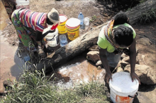 COMMUNITY'S WOES: Some residents of Spring Valley informal settlement in Emalahleni rely on springs for water. Emalahleni has been crippled by a water crisis that began 15 years ago photo: Bafana Mahlangu