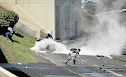 WAR ZONE: Students engage in violent protest action over financial aid on the University of KwaZulu-Natal's Westville campus this week Picture: TEBOGO LETSIE