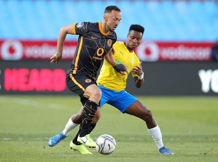 Samir Nurkovic of Kaizer Chiefs is challenged by Themba Zwane of Mamelodi Sundowns in the DStv Premiership match at Loftus Versfeld in Pretoria on September 12 2021.